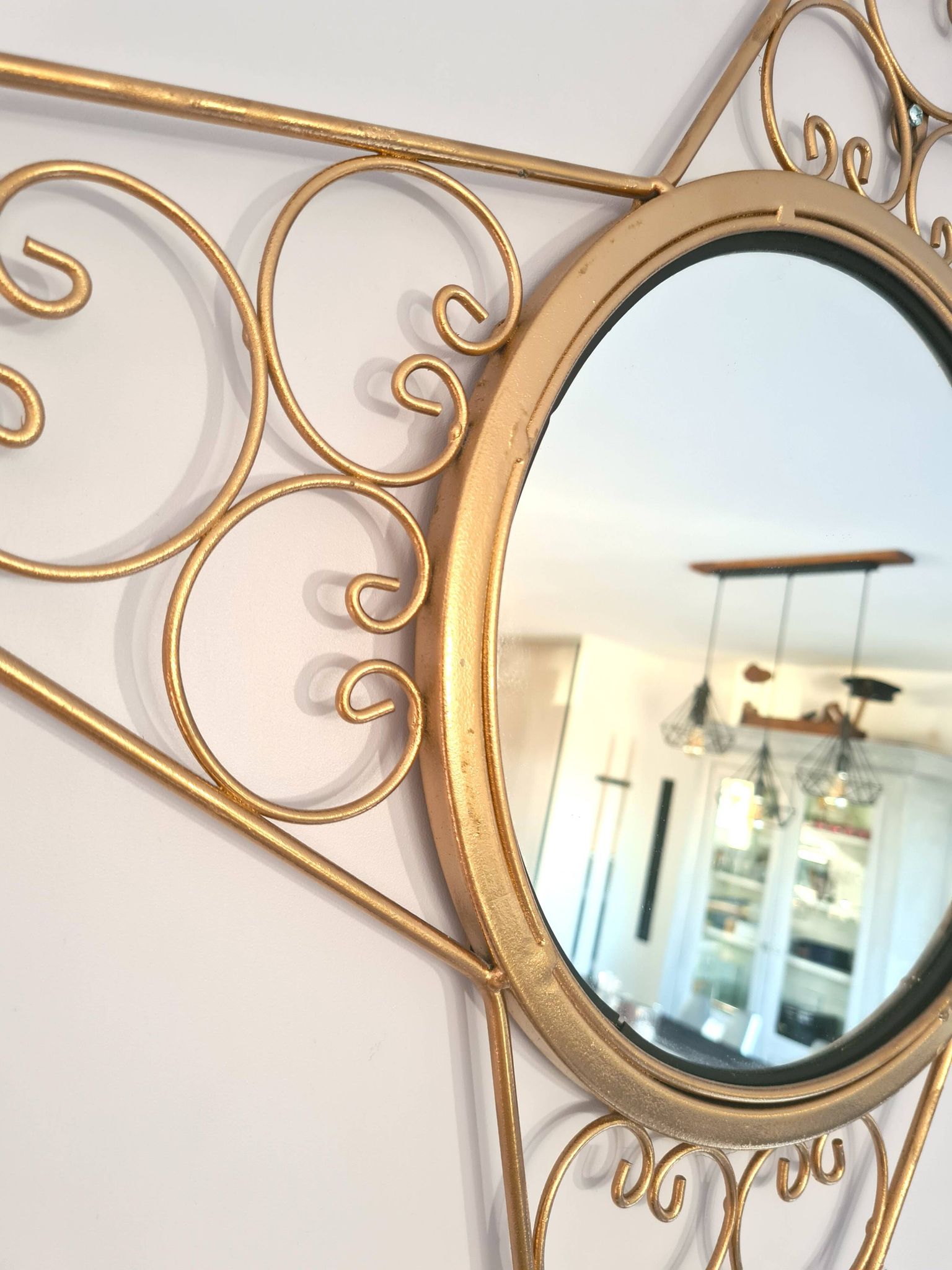 Miroir étoile doré en métal – décoration murale de charme