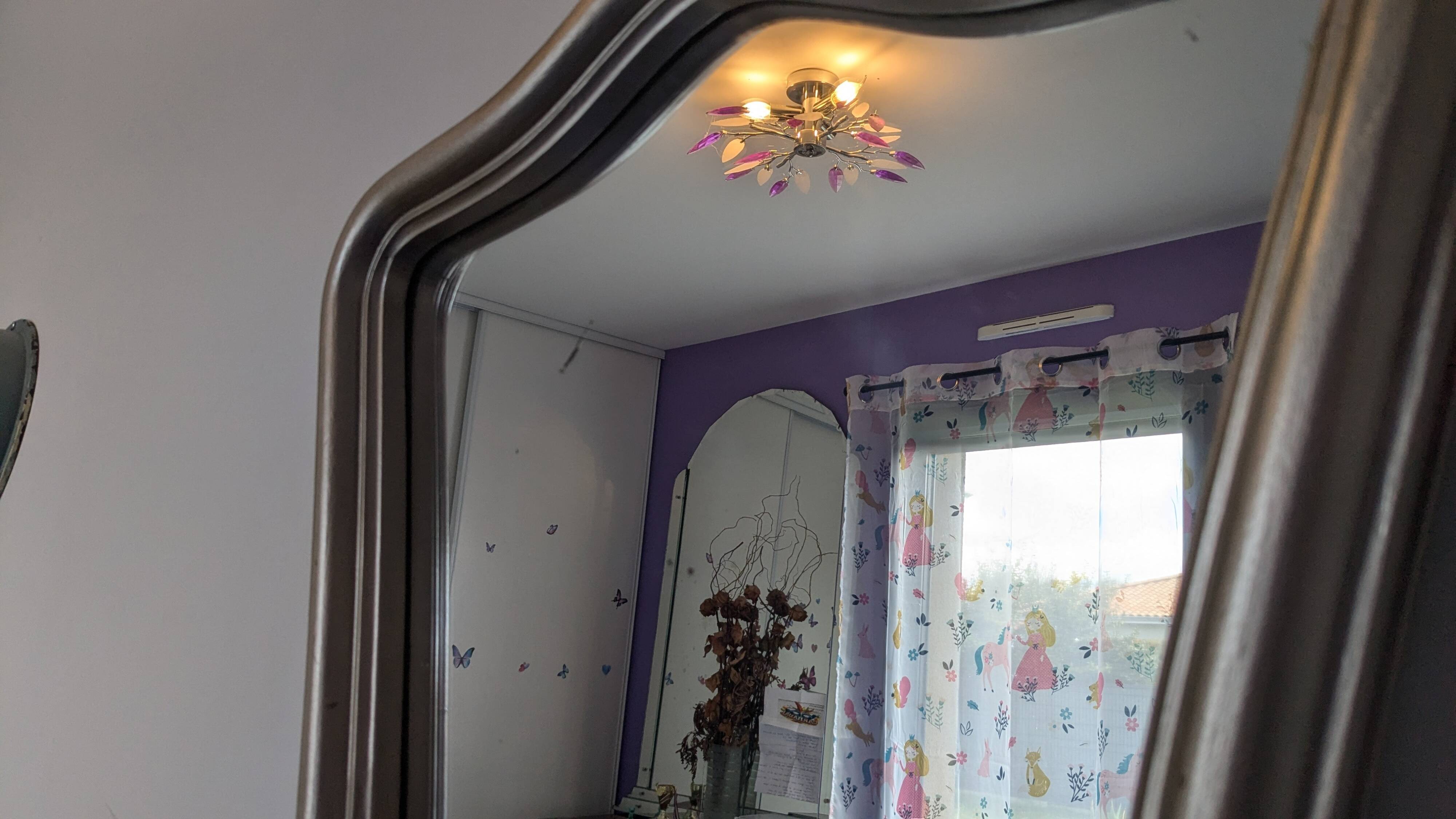 Miroir style Louis XV argenté 67 x 50 cm