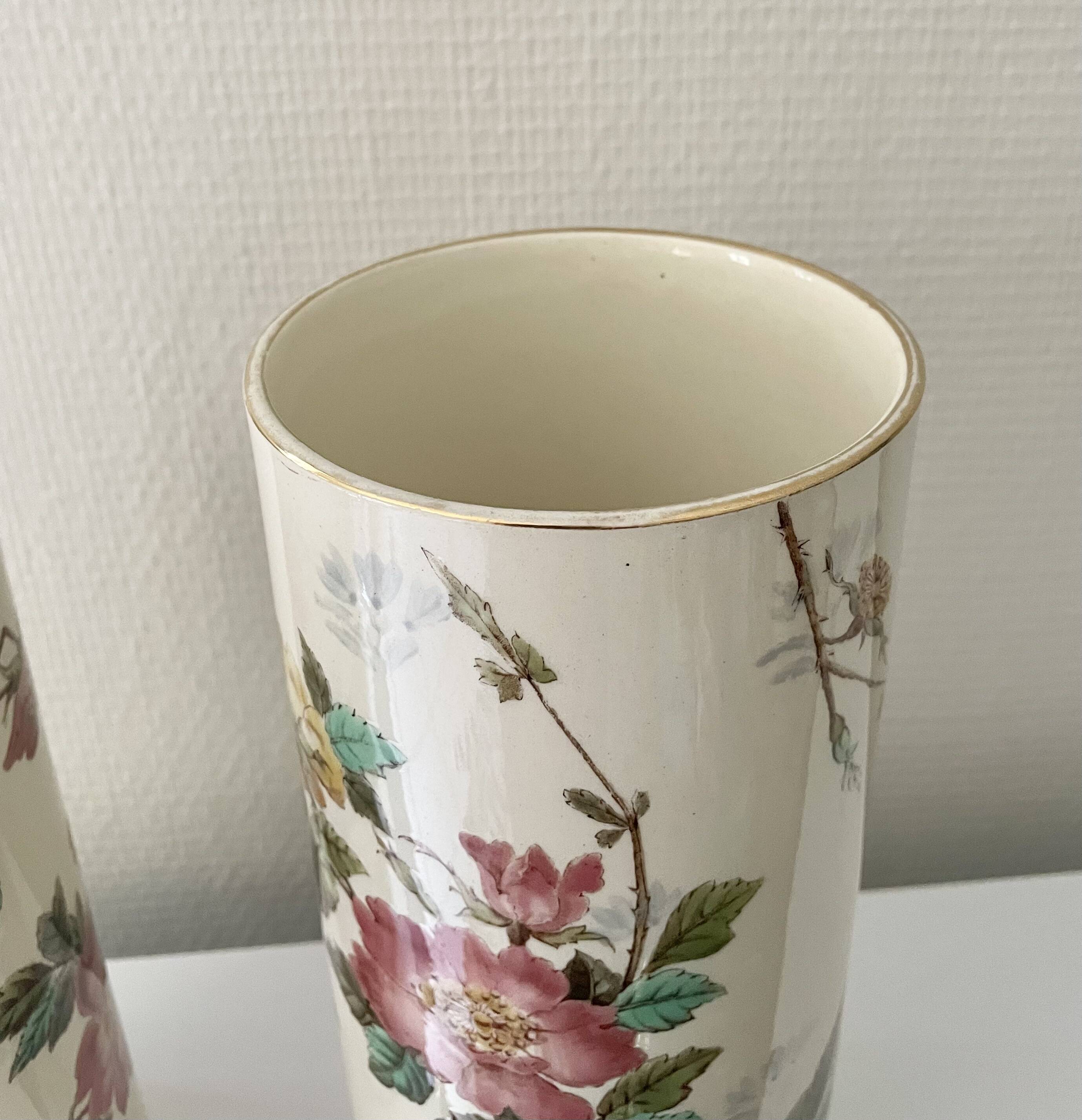 Roller vases in earthenware with floral decoration of wild rose, circa 1930–1950.
