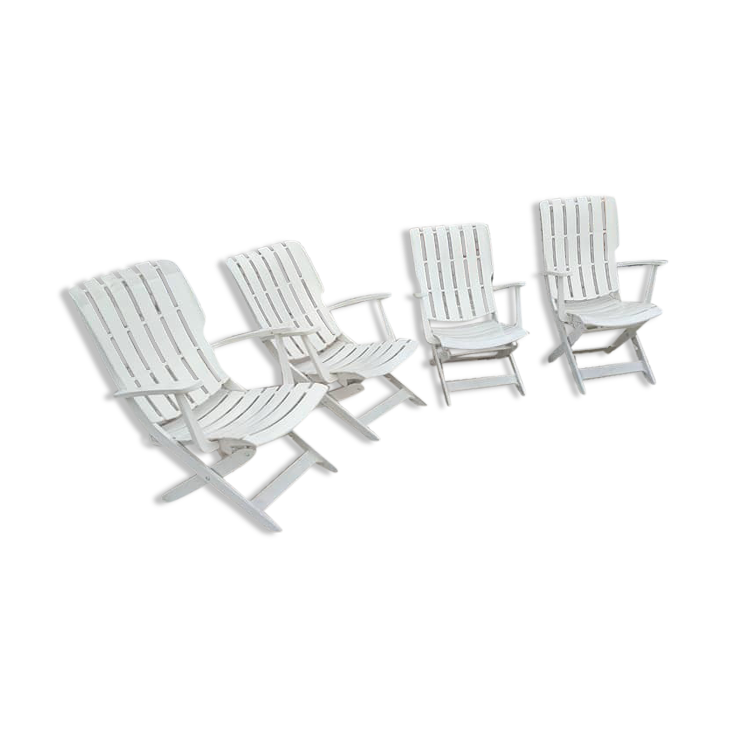 Four Grosfillex armchairs