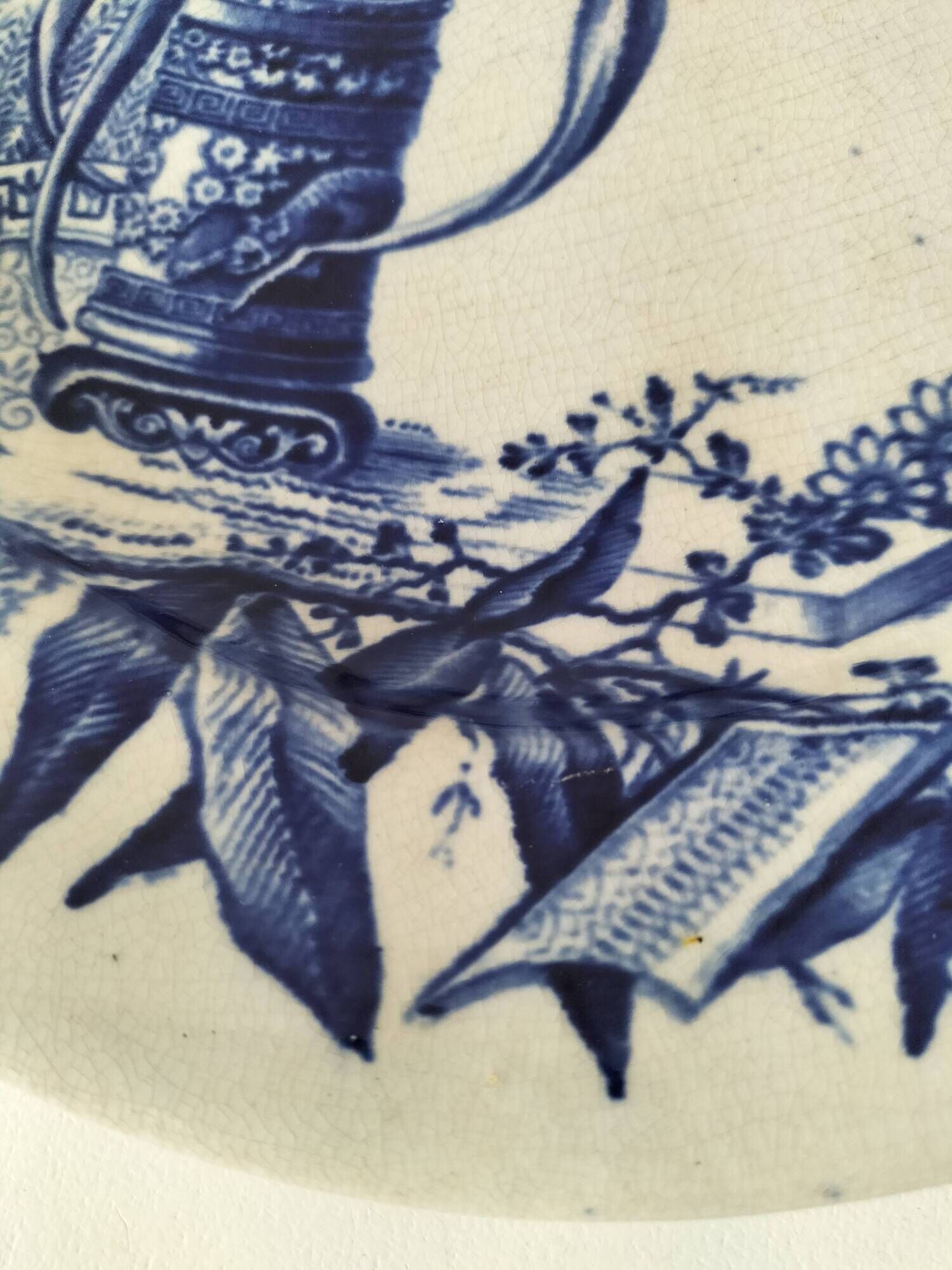 Antique plate with Chinese blue oriental decoration from the late 19th century.