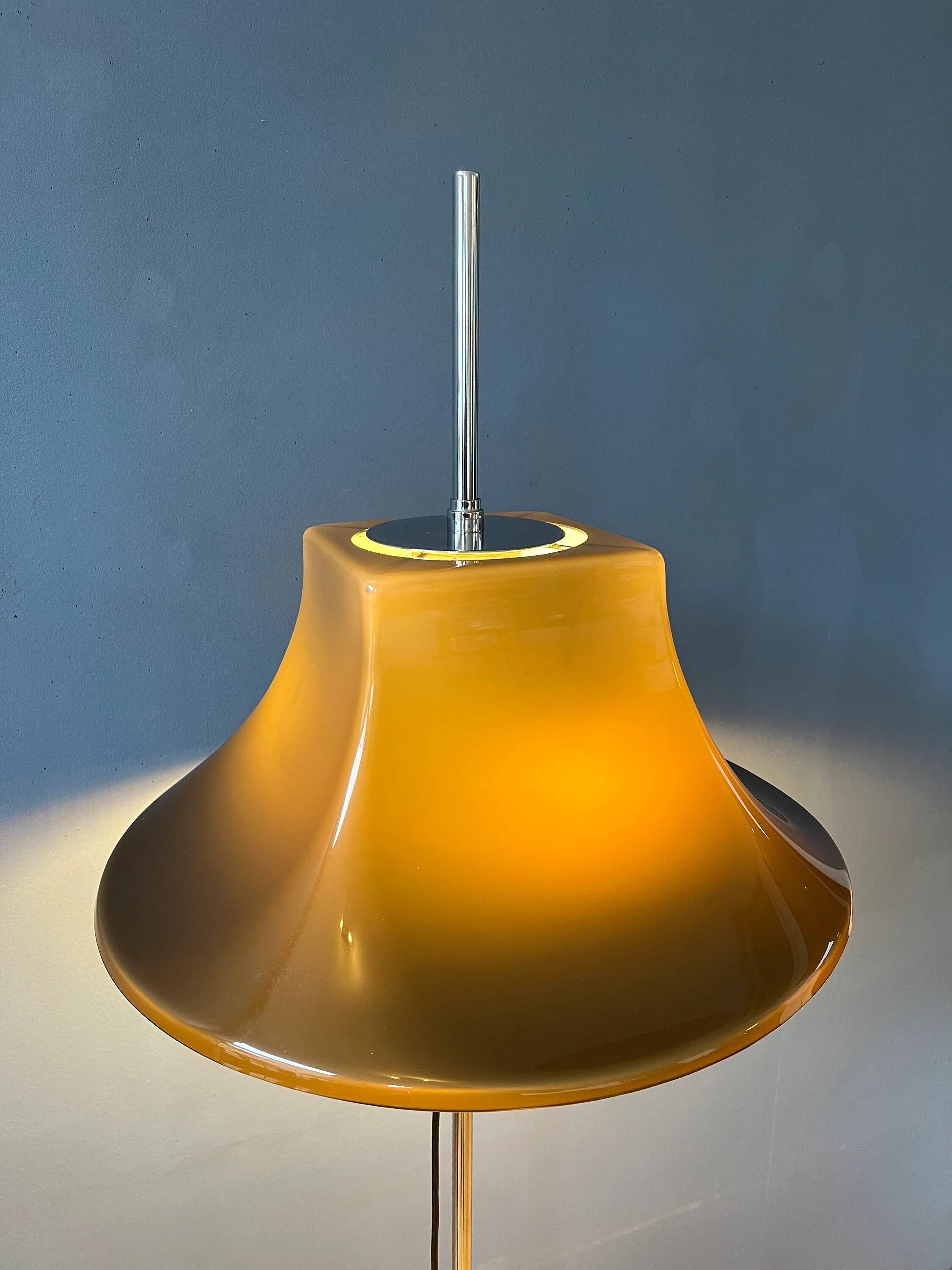 Space Age floor lamp by Willem Hagoort with a beige witch hat-shaped shade.