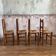 4 Art Populaire chairs in wood and straw