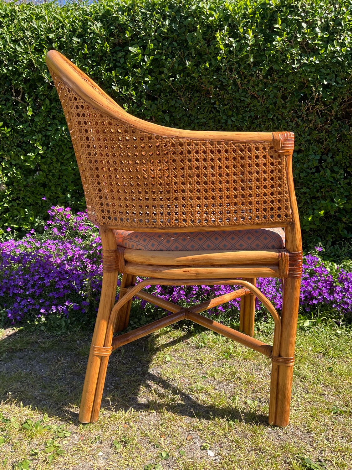 Mc Guire style armchair in rattan and caning from the 1980s.