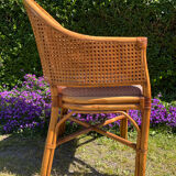 Mc Guire style armchair in rattan and caning from the 1980s.
