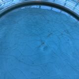 Cracked earthenware plate the Eiffel Tower