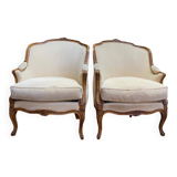 Paire de fauteuils bergères gondoles de style Louis XV