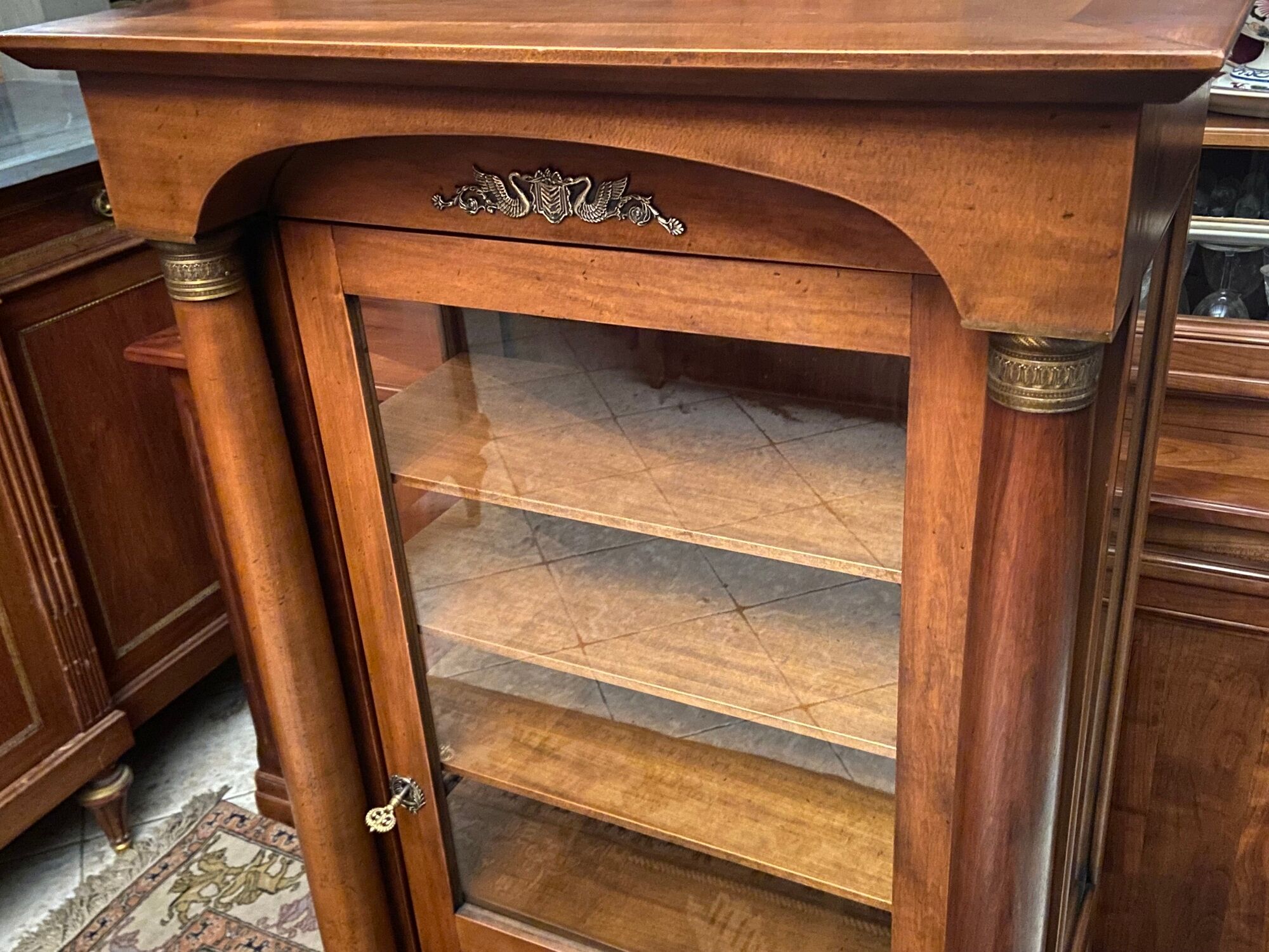 Empire style display case in cherry wood