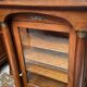 Empire style display case in cherry wood