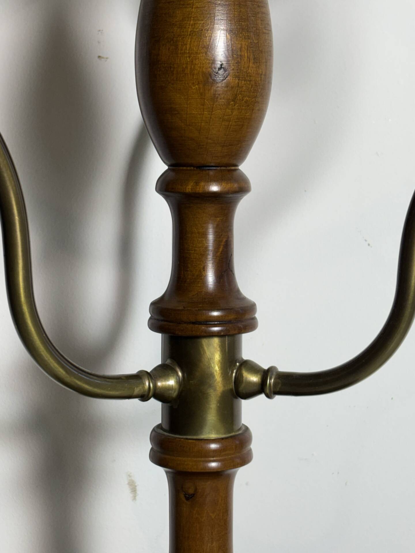 Umbrella stand and English-style wooden and brass canes, 20th century.