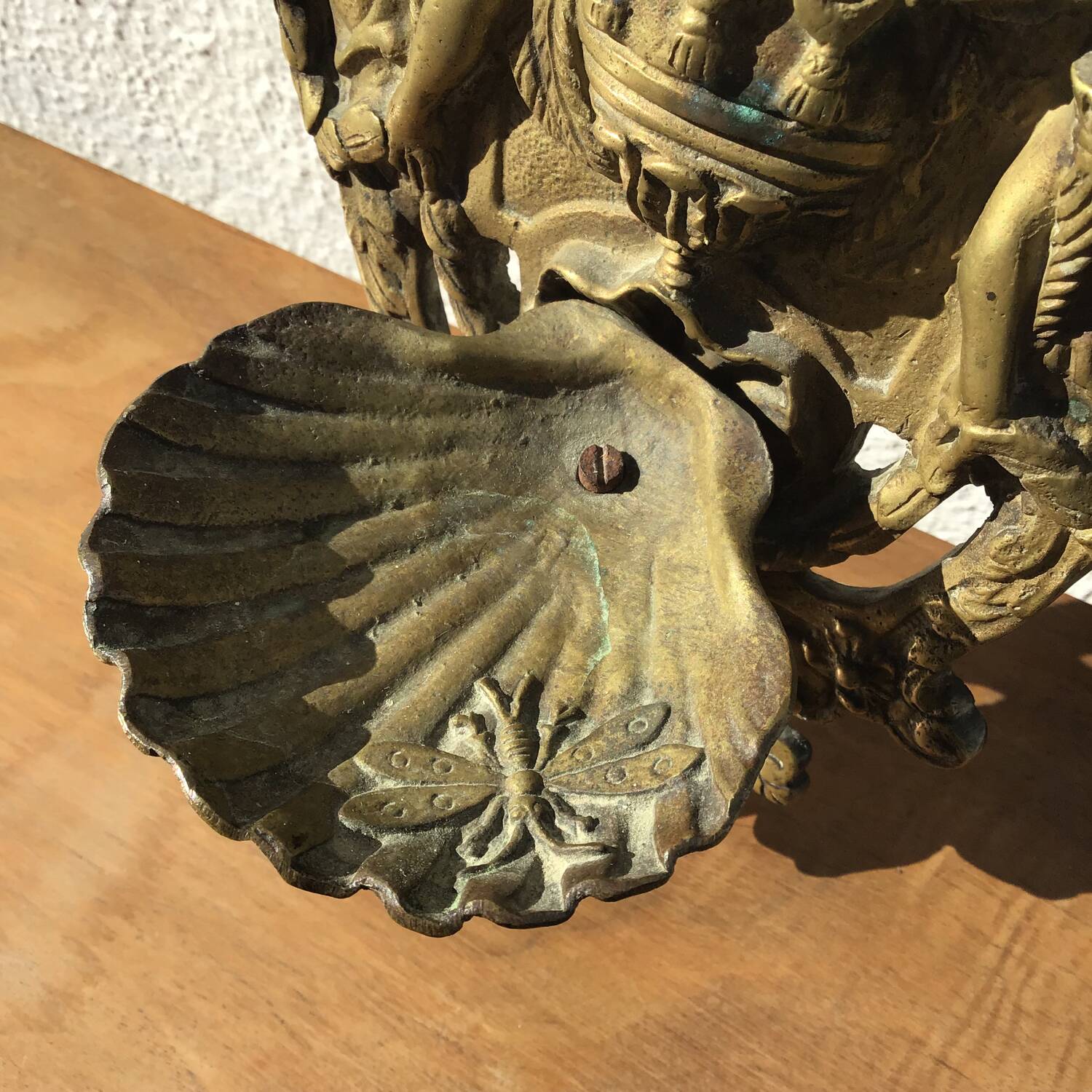 Bronze holy water font