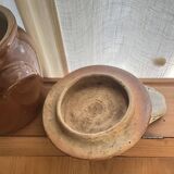 Ancient ceramic salt cellar and its lid.