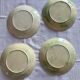 Lot of 4 Onnaing barbotine plates with grapevine design.