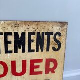 Old plaque “Apartments for rent”