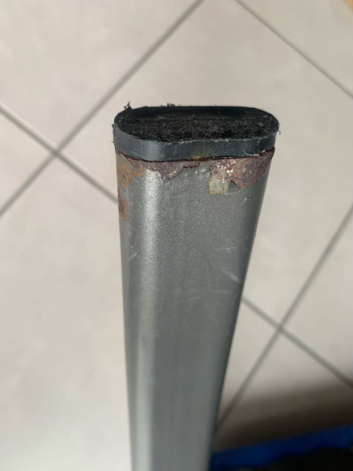 Black metal design armchair with blue fabric. 1980s.