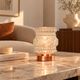 Punkette — Vintage table lamp in transparent glass with rose gold reliefs.