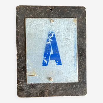 Letter A on metal plates
