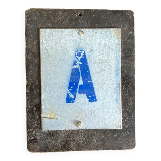 Letter A on metal plates