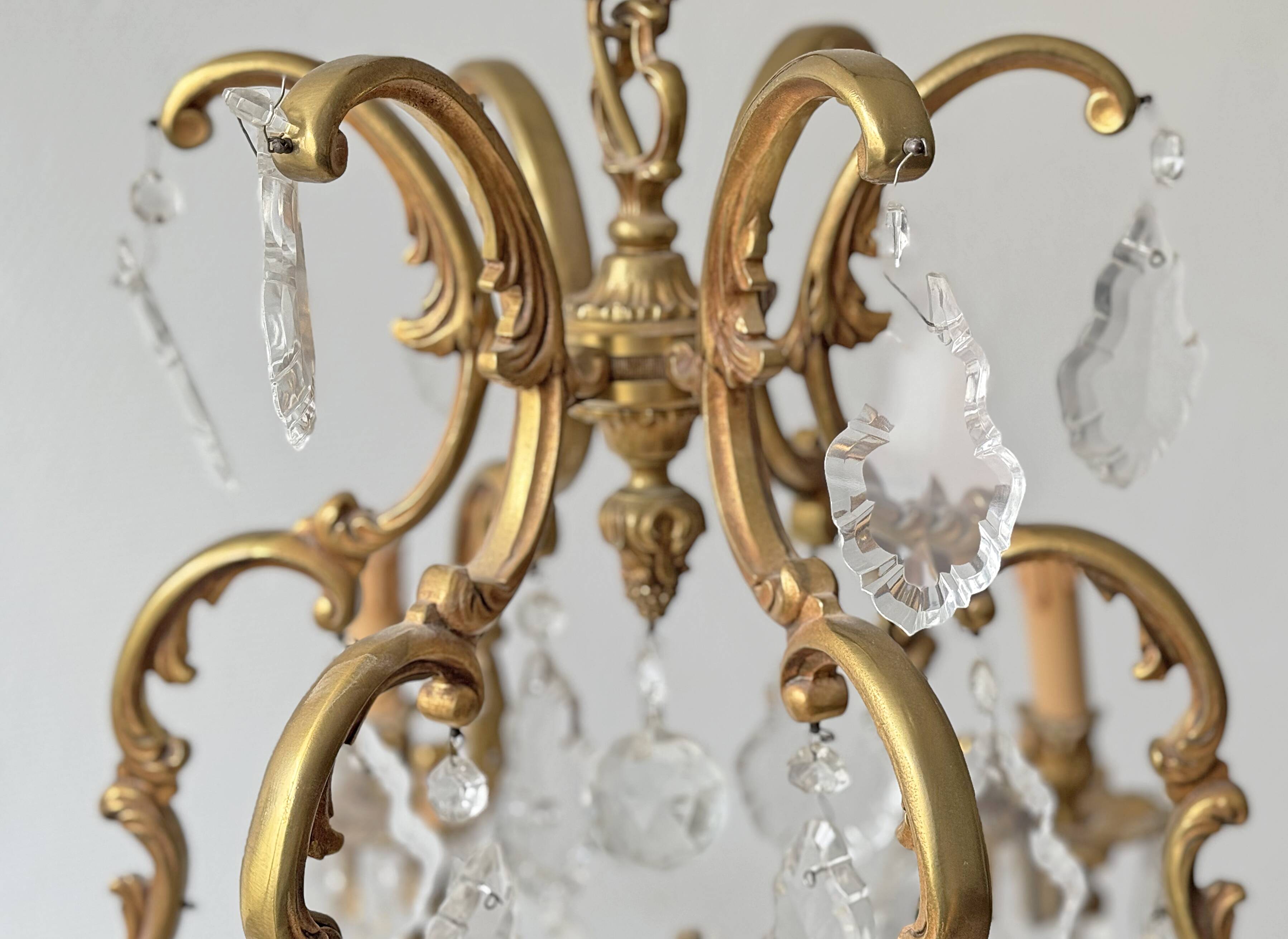 Louis XV style chandelier in gilded bronze with 6 light arms.
