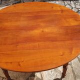 Round oval table with solid cherry leaves, 19th century