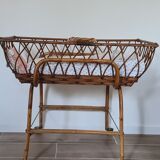 Vintage wicker and rattan couffin on wheels