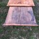 Antique farmhouse table in solid cherry wood with 2 drawers and 1 pull-out at the end with turned legs.