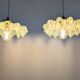 Pair of green opaline glass pendant lights – frosted poetry & Art Deco brilliance