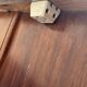 Modernist desk in wood and green moleskin upholstery