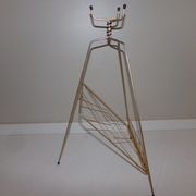 Vintage magazine holder in gold metal