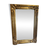 Rare Louis XV mirror with mercury glass, gilded wood, 19th century.