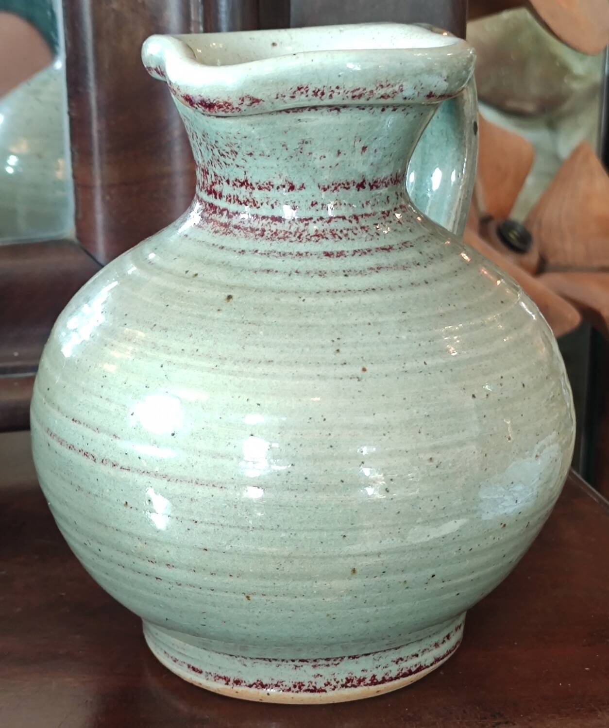 Old small glazed ceramic pottery pitcher