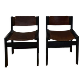 2 wooden and leather chairs