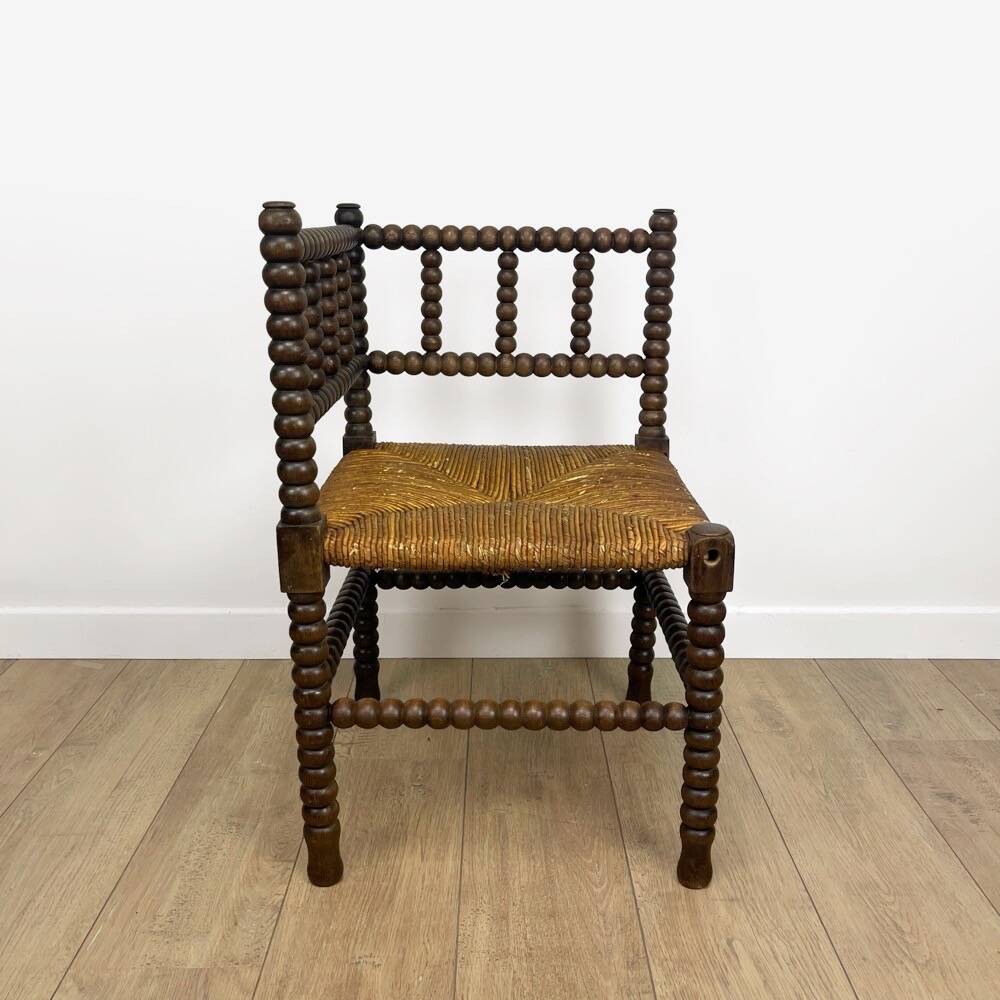 Old wooden ball fireside chair
