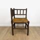 Old wooden ball fireside chair