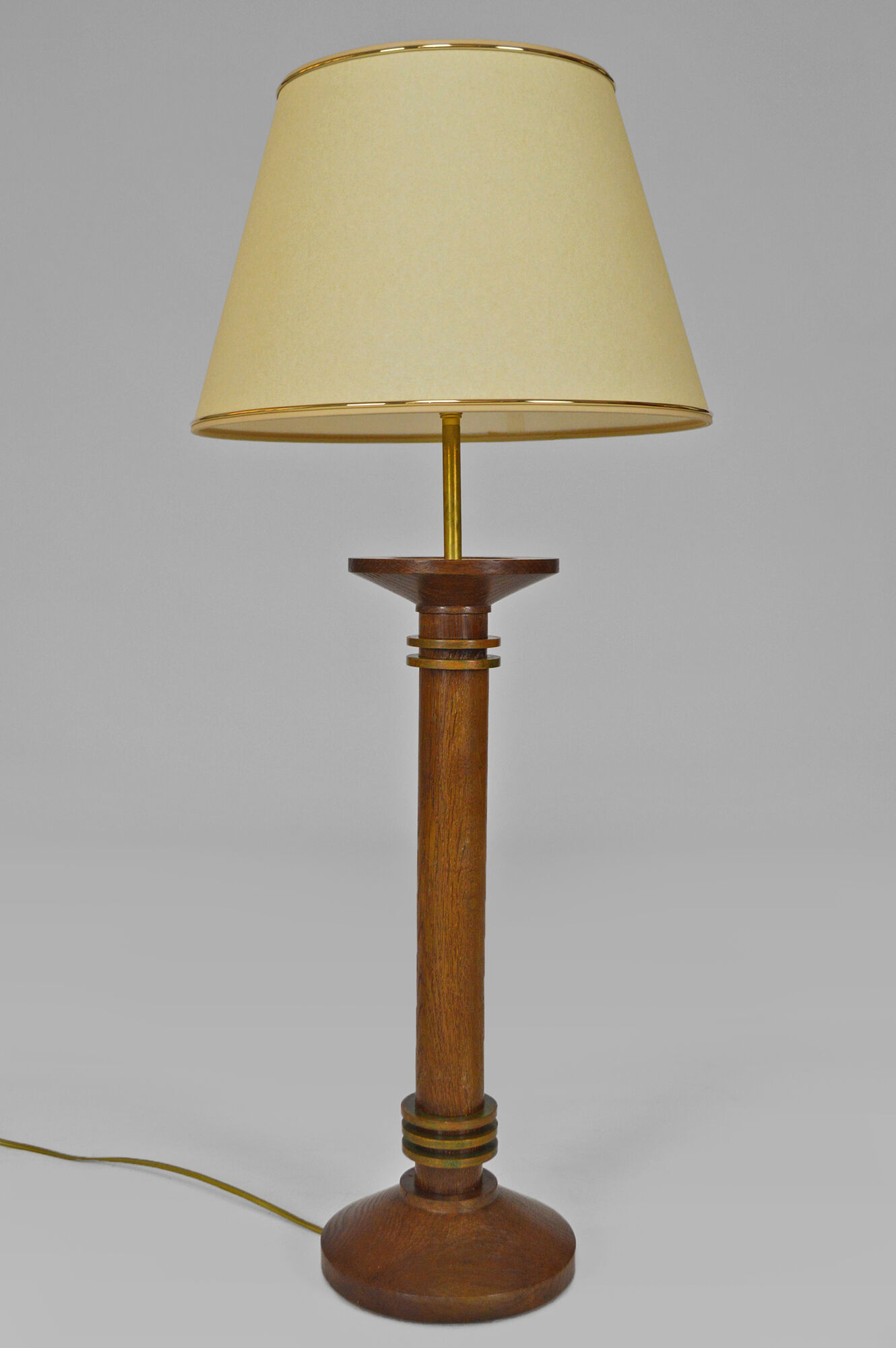 Pair of art deco lamps in wood and patinated bronze around 1930