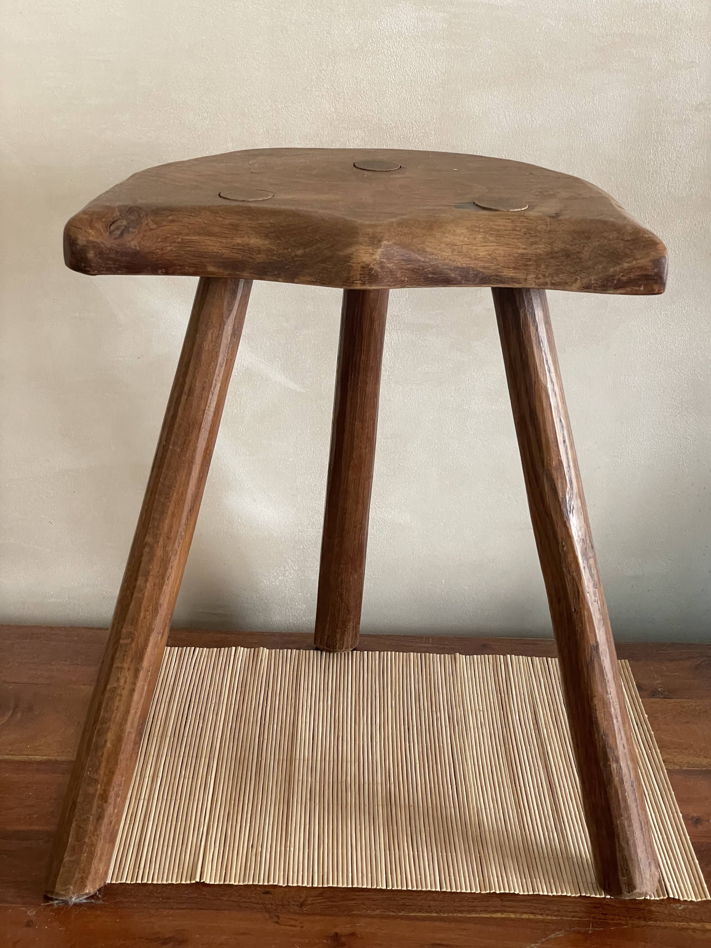 Wooden tripod stool