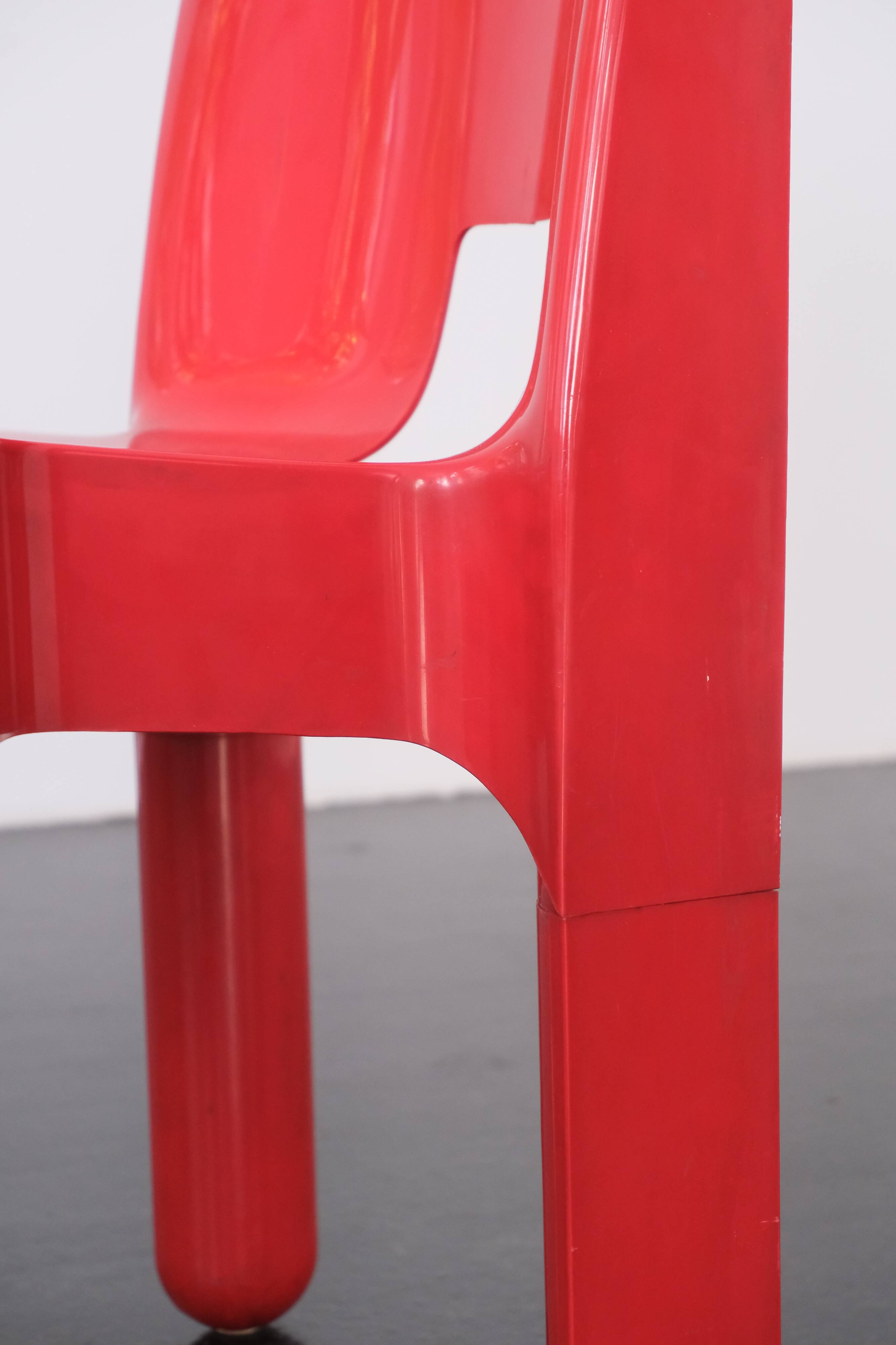 Red "Universale" chair by Joe Colombo / Kartell