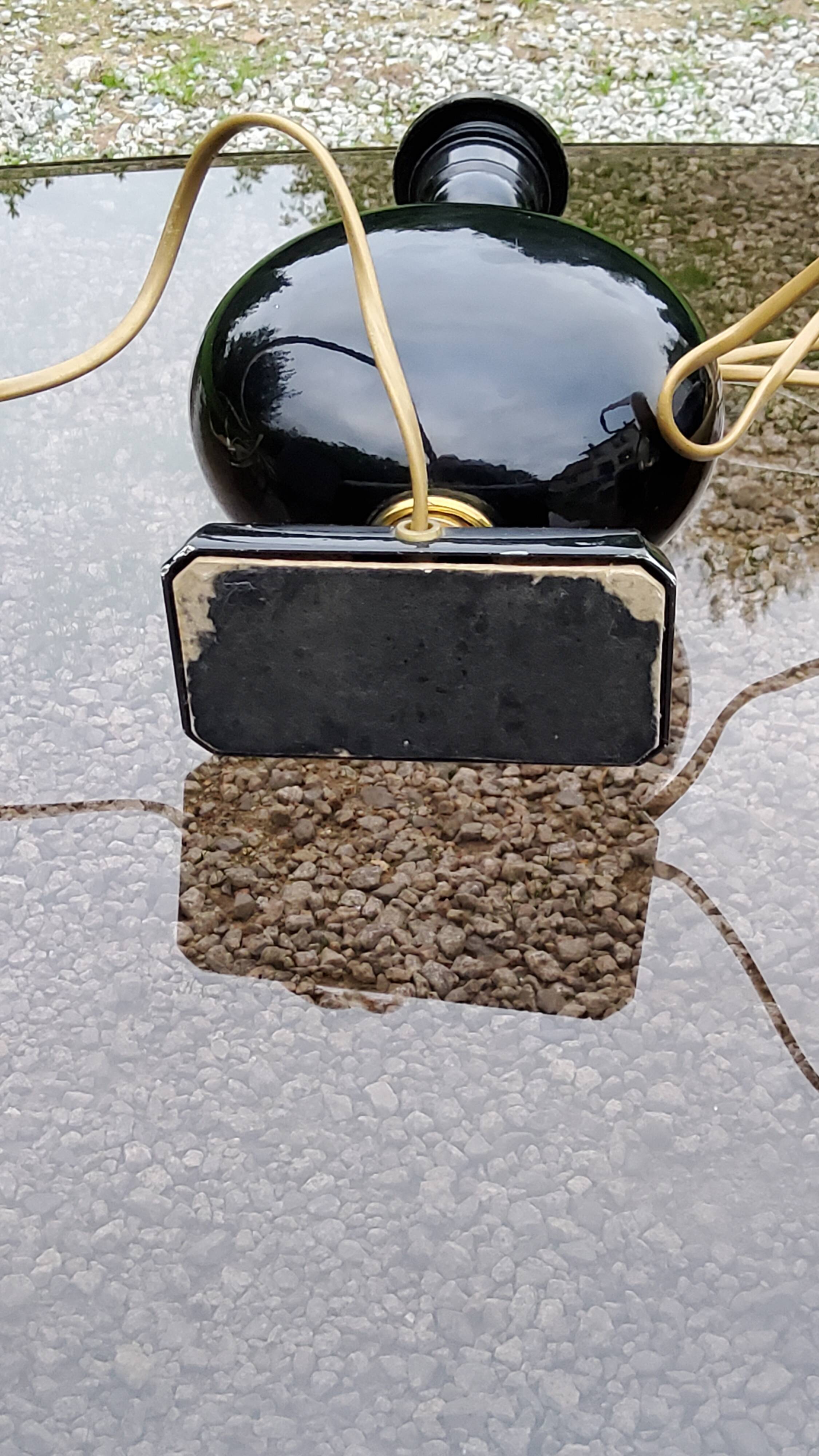 Pair of 70s designer lamps in black ceramic and gold metal