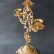 Antique three-light openwork brass church candelabrum.