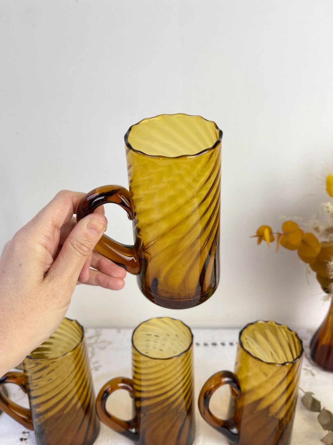 Set of 5 vintage beer glasses in amber twisted glass