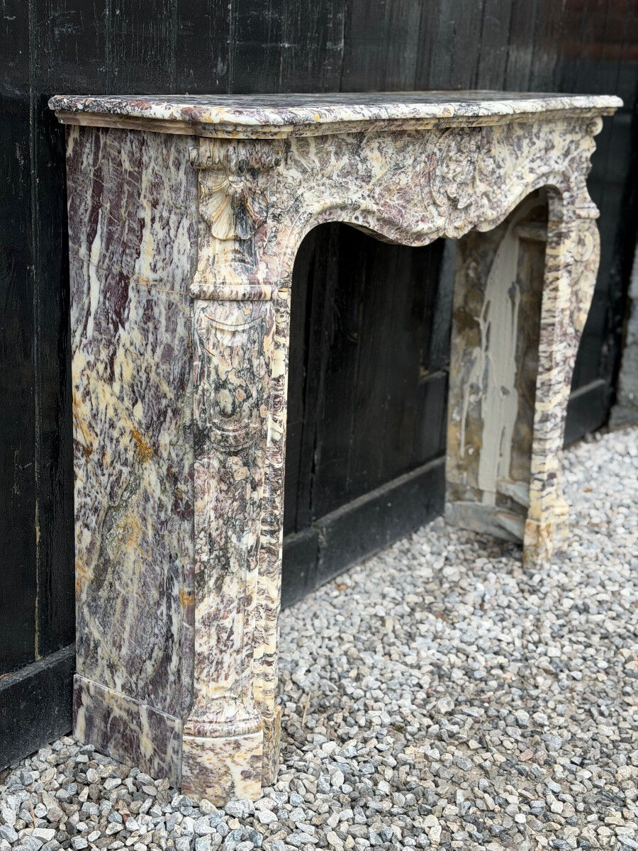 Louis XV style fireplace in Brocatelle marble, circa 1880.