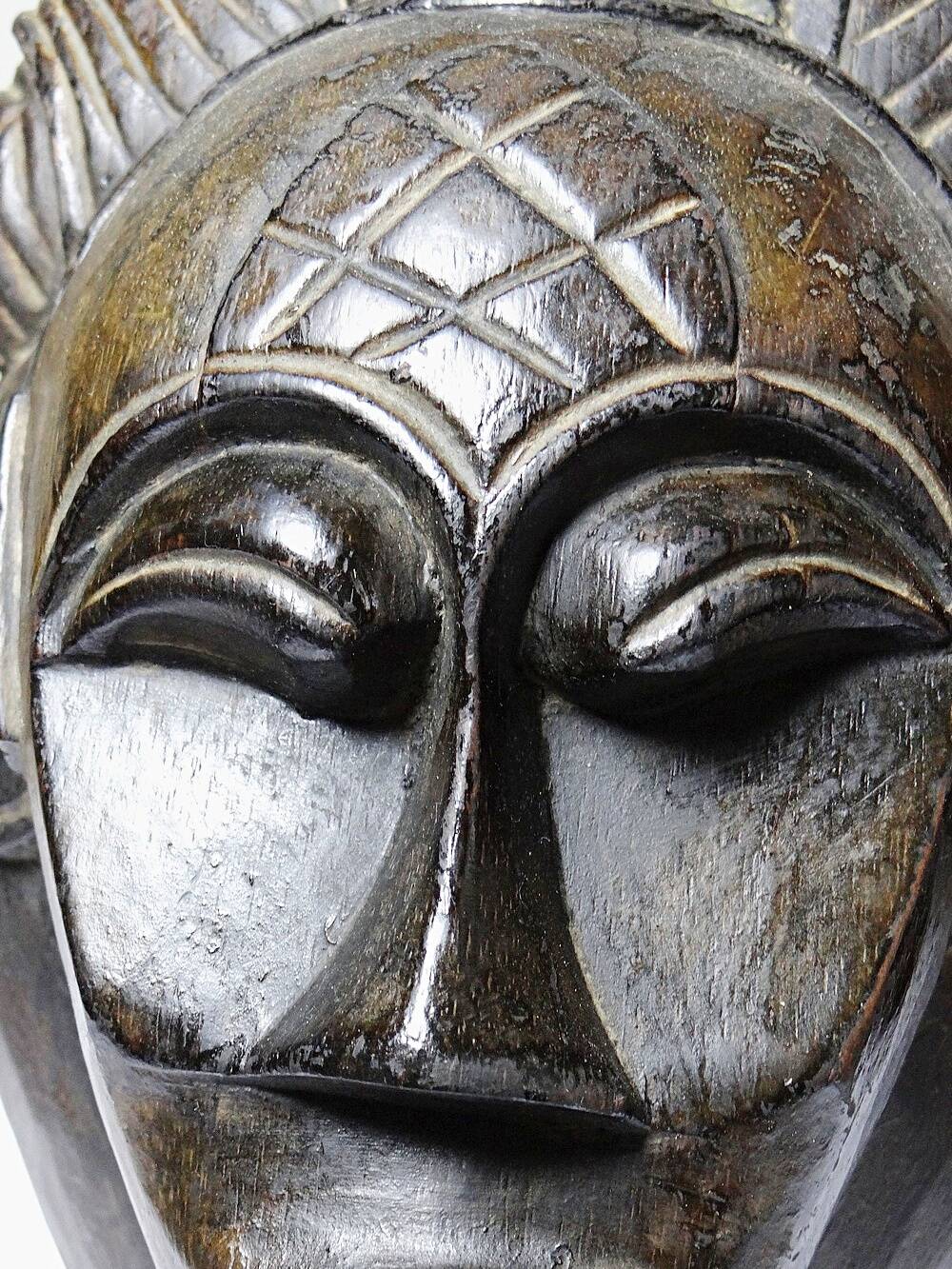 Decorative African wall mask in Punu Tsangui style, carved wood, 20th century.
