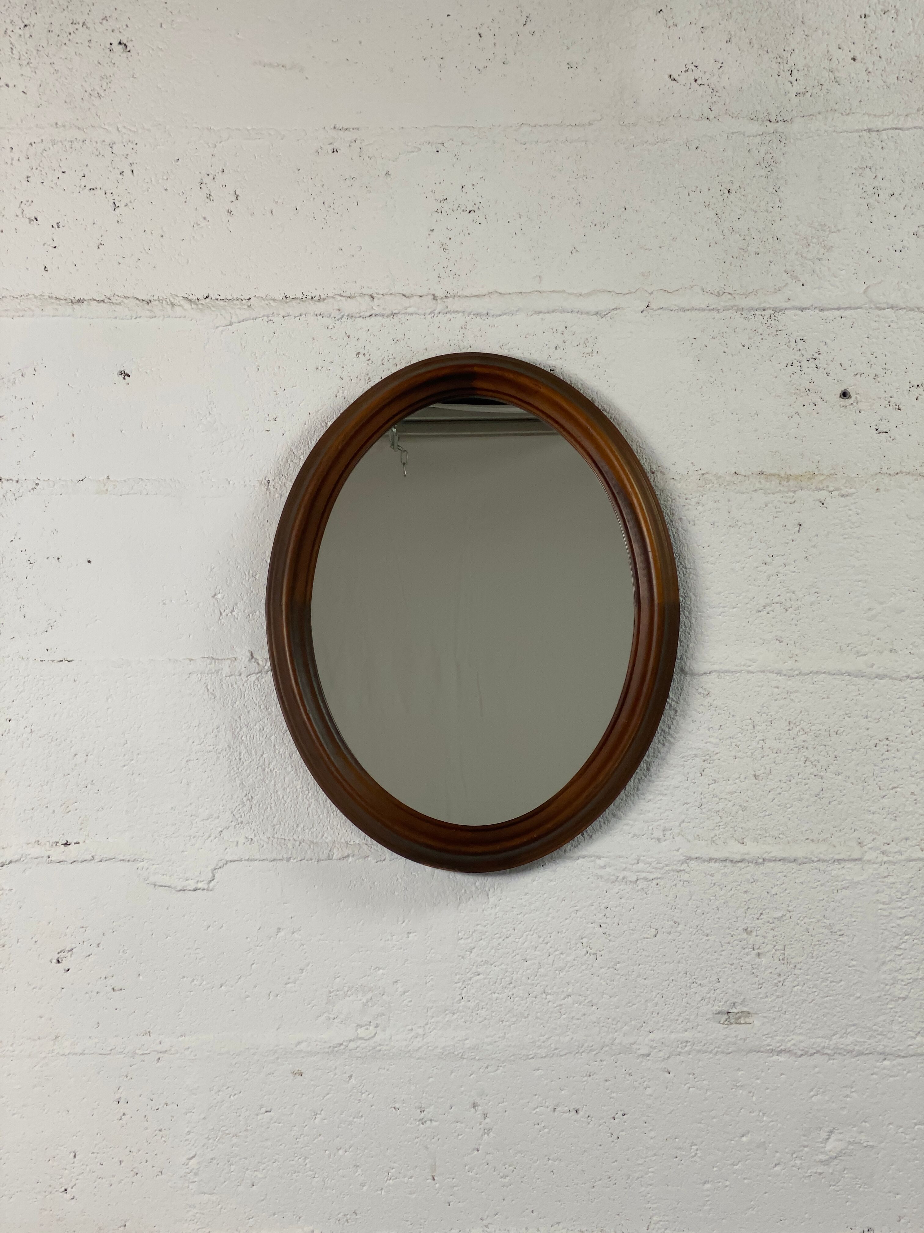 Oval wooden mirror