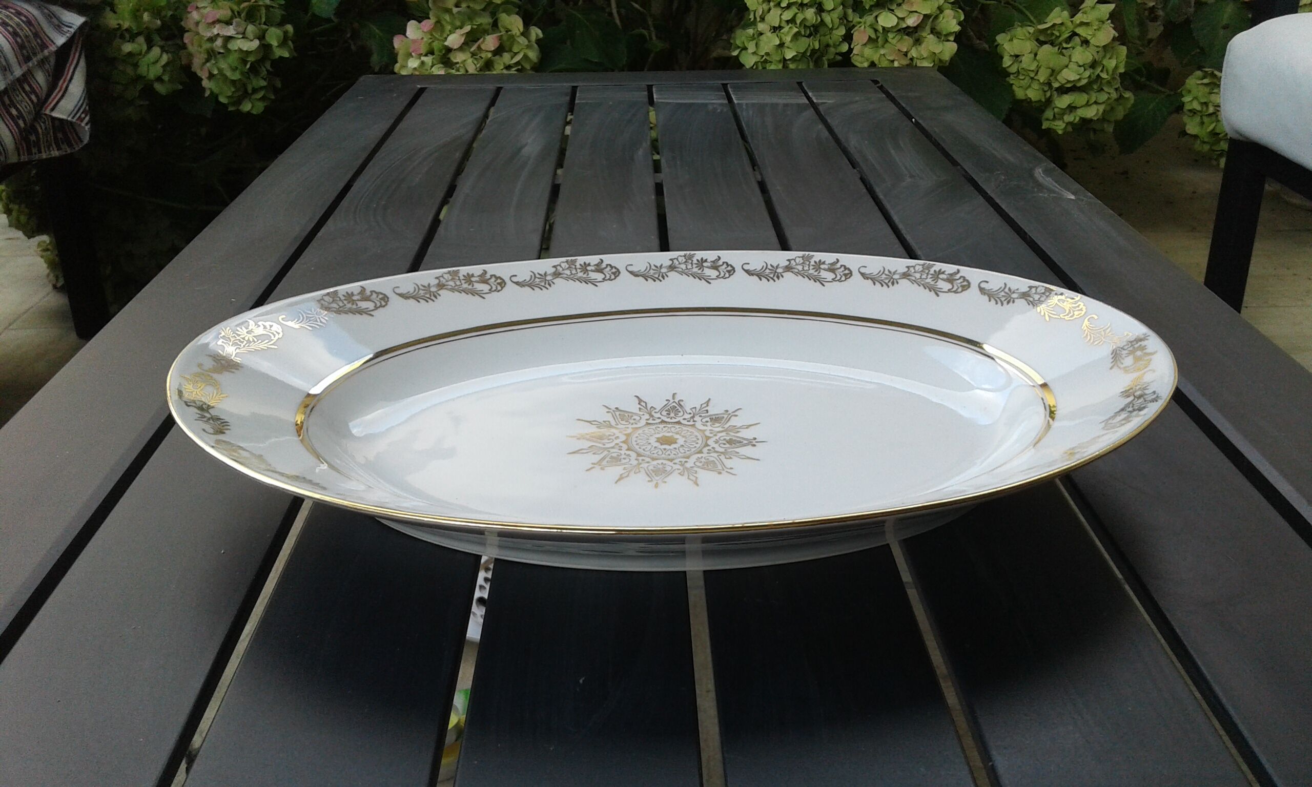 Oval dish in porcelain signed LJ & cie