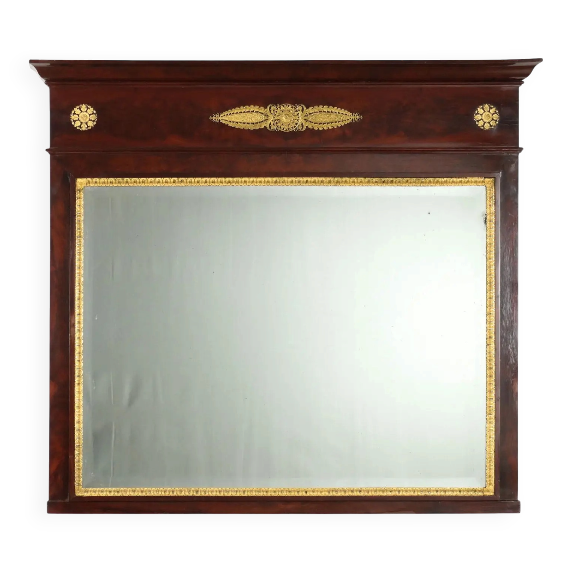 Antique Empire fireplace mirror in mahogany with a bronze frame, Italy, 19th century.