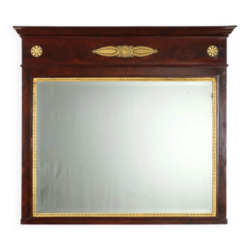 Antique Empire fireplace mirror in mahogany with a bronze frame, Italy, 19th century.