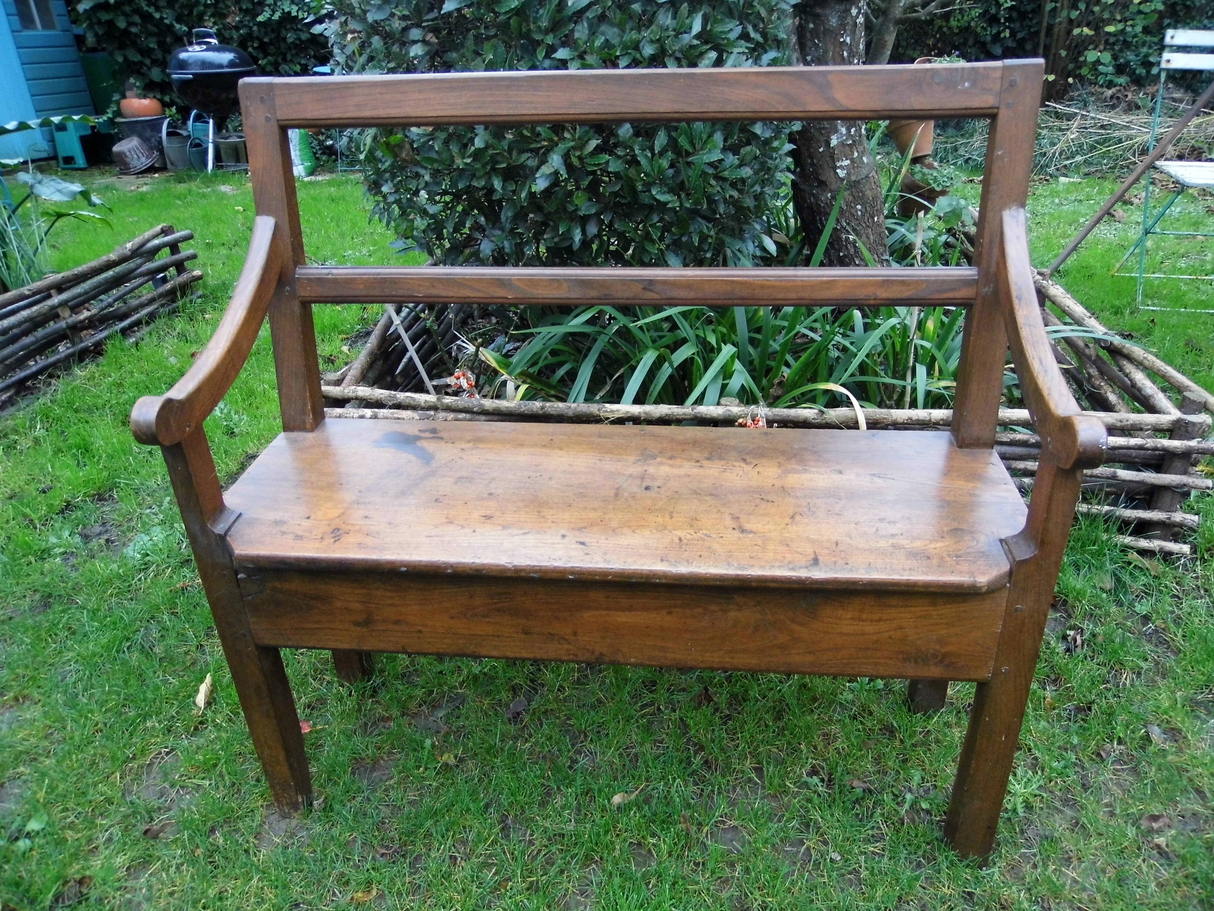 Ancient chestnut bench with armrests, late 19th century