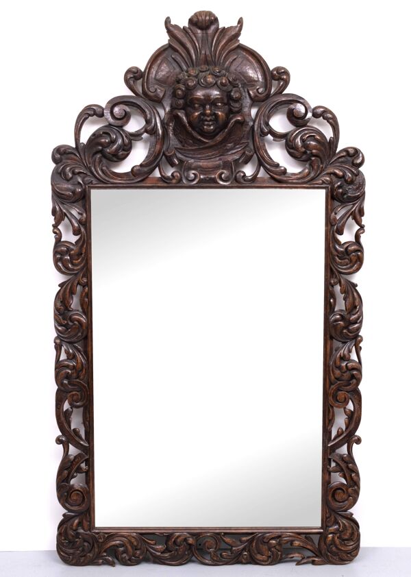 Miroir monumental ancien du XVIIIe siècle en chêne, orné d'un chérubin, de Hollande.