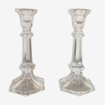 Pair of antique candle holders in transparent glass