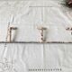 Vintage enameled cast iron wall hook with 3 hooks